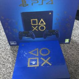 Blue & gold with two controllers & original box. Fully working & in good condition.