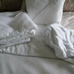 A Gorgeous White & Grey Trim Cot Bumper Bed Set with Cushion & Fitted Sheet to Match , Its been Used , On one photy close up there is a very slight mark think it was off the peg when on wash line not that noticeable , Other than that in very good Condition , COLLECTION ONLY
