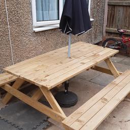 a new picnic table in wood brought from garden centre but too big for my patio area
