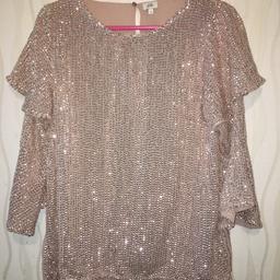 Beautiful sequins ladies top 
In very good condition