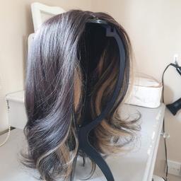 Dark Brown/Blonde
Bought but sent wrong one
Comes with wig stand