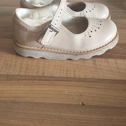 cream in colour, size 7g some wear to the shoes but plenty of life left in them, look gorgeous with anything! too small for my little girl now.