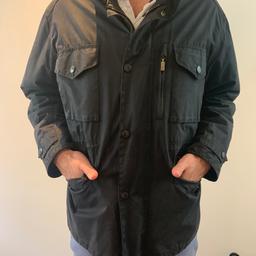 Very good condition - waxed jacket with quilted interior and inside pocket.