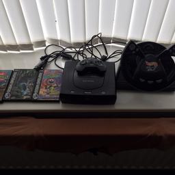 I’m selling a sega Saturn model 2 along with steering wheel and 3 games the joypad has a slight nick in it but works perfectly
Comes with all cables 