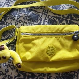 Small kipling bag, cross body strap.
Bright yellow 💛 
Never used.

Monkey name and bag model - Sarah 

Ideal for holidays.

Collection  only.
