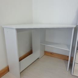 Selling a white computer desk for £40. Has some minor defects such as pencil markings and smudges but otherwise in great prestige condition.