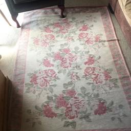 Pink and green coloured rug. Length 5ft ‘10, Width 3ft ‘10
