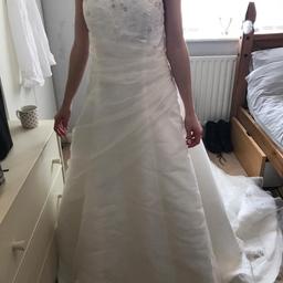 beautiful wedding dress
size 16 although can be altered by corset style back
corset back
beautiful long train
this dress has not been cleaned
few Mark's on underside of train
collection only
I do not post