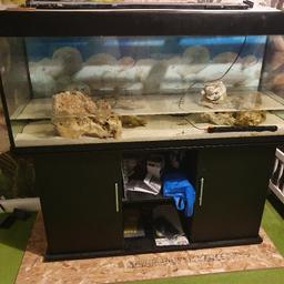 Aqua one Fish tank and black stand  full detail in picture! 
145cm length 
55cm depth
60cm height
few scratches on the glass as always therr not half as bad once filled with water , seals are fine and in good condition the tank is solid aswell as the stand comes with 40kg ocean rock, 25kg coral sand, loads of balanus 1x heater
T5 lights just need a new lead (old one damaged)
fluval marine light just needs replacement transformer it will work fine 
any questions ask 
 £175 ono