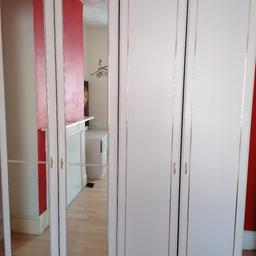 Tall cupboards with hanging rail and shelf.
Amazing space and value for money!
One cupboard is fully mirrored, as shown.

Together they measure 180cm (W) x 210cm (H).

Individual WARDBROBE measurements 210 x 90cm.

If wardbrobes are bought individually, they are priced as:
- Mirrored cupboard £40
- Plain white Cupboard (non mirrorred) £40
- Comes with a matching dressing unit with 6 drawers £30

Dressing table measures Length 100cm x 47cm Width and 71cm Height