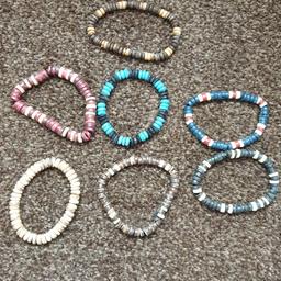Brand new elastic bracelets in a mixture of colours.