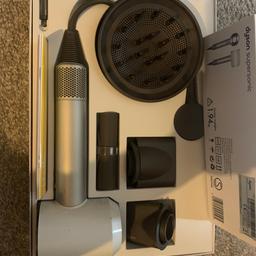 Comes with box and accessories. Accessories never used so these are new. Hair dryer used but in excellent condition