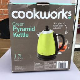 Green kettle, used.
