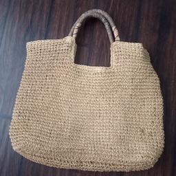Large Topshop vintage look fully lined bag. Magnetic fastener with a small zip compartment inside.  Never been used. Tiny flaw on the wicker part. doesn't affect use though. Sorry no returns. Can post at additional cost through PayPal x