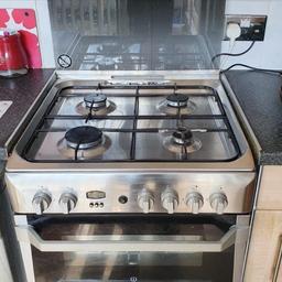 Gas cooker with double oven and grill. Stainless steel and black. Collection only. In Curry is £379
