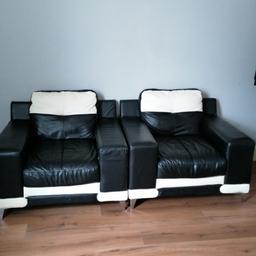 Black and white leather arm chairs 50ono for the pair will sell as singles collection only