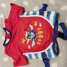 red white and blue life jacket. adjustable.  self inflatable inner chest.  excellent condition.  used twice.