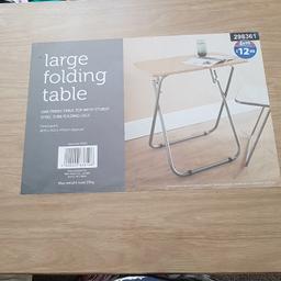 new oak finish table with folding legs 
size dimentions on the label  .bought for £12.99 from b&m..collection only