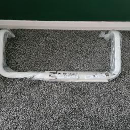 ikea mulig clothes rail, fix to wall to save space 
as shown.