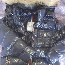 boys moncler coat age 4 5 years like new only worn a few times lovely coat Its not 100percent  athletic but it is a extremely good copy as I give 150 for it my self thear s real fox fur on it x