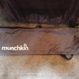 munchkin safety gate has carry bag to take it with you when travelling been used two or three times can be adjusted to fit different size stairs/door frames