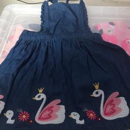 Dress from
M&co age 2-3 denim dress with swans on with cross over back fastening with adjustable straps, worn once, from smoke and pet free home please see my other listings 