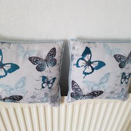 2 lovely very clean small cushions with butterflies on £6for both