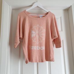 Blouse"Reebok"Classic Pale Light Apricot Colour

Good Condition

Actual size: cm and m

Length: 60 cm from shoulders

Length: 31 cm from armpit side

Length sleeves: 43 cm from neck sleeve raglan

Volume hand: 50 cm from neck

Volume chest: 1.10 m – 1.29 m

Volume waist: 1.02 m – 1.15 m

Volume hips: 95 cm – 1.10 m

Size: S,8/18 (UK) Eur S,34/36

Main Material: 100 % Cotton

Made in China

Price £ 9.90