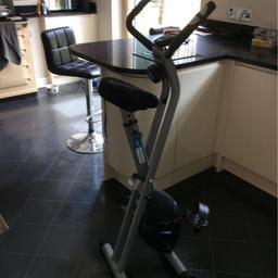 Pro fitness exercise bike hardly used good condition counts distance,pulse and calories and speed. Folds away for easy storage 