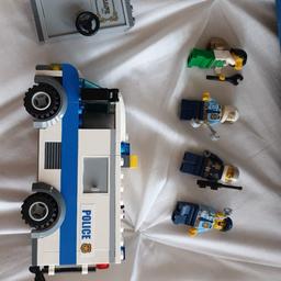 No idea if all bits are there, 4 figures, 3 are Police and one looks like a maintenance man...