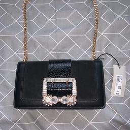 River island small hand bag - perfect for an evening out - brand new with tags never used - someone gave this me for a gift but it’s just not my style :(