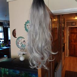selling for my sister long grey curly wig good condition never used tryed on but wasn't to her suiting its collection only from stourbridge no posting no delivery she wants £10 ono