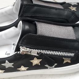 Brand new, with tags, casual trainers from Next

Black faux leather, white border, funky gold & silver star detailing, with side zip fastening

UK size 3, EUR 36

Bought for £21, tags still attached.