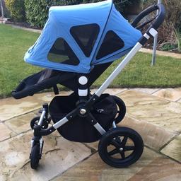 Blue Bugaboo Sun Canopy
Can’t recommend enough - much more useful than regular hood - baby enjoys seeing out and also not getting too hot!

Expands right out and also has mosquito net built in.

In good condition, very well looked after and has been cleaned. From pet and smoke free home.

Has some sun fading to inside front section (see photo). Comes with original packaging and manual.

RRP £75