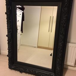 Black ornate leaner / wall mirror. Gallery Direct Antwerp mirror - dimensions 49”x37” / 1244mmx940mm. Fantastic looking piece of furniture, the mirror has a unique decorative black frame. There is slight damage to the frame in parts this is reflected in the price. Happy to send more pics if required. Horizontal/vertical fixing clips already fixed to back, see reverse pic. Also includes original fitting instructions in sticker form on back. COLLECTION ONLY