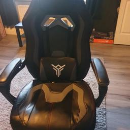 yourliteamz massage gaming office chair with foot rest.

brand new my son changed his mind on colour.