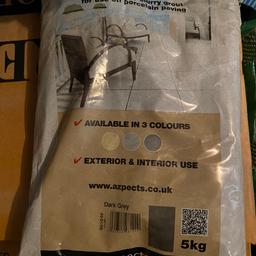 Grout for slabs in dark grey 
5kg bag x 4 new bags and one bag with a split in it. 
Slurry grout suitable for porcelain slabs 

Collection only lower gornal.