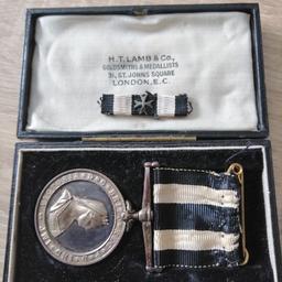 First I have a WW1 St John's ambulance service badge. It was issued to Lillian A Pearce for service Aug 1914 to July 19th 1919 and is in good condition.
I also have a boxed post WW1 St Johns Ambulance service silver medal. The medal and box are original and in good condition. This medal was also awarded to Lillian Pearce.
It is engraved around the edge as follows :
10530. A/SIS. L. Pearce. BARRY HILL NSG DIV. PRIORY FOR WALES. SJAB. 1931.
These are 2 lovely pieces that go together.