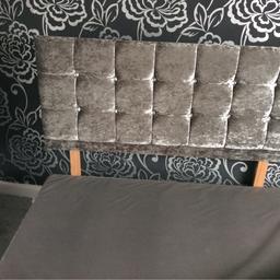 Grey double bed and grey velour headboard bed is in two halves base in on castors with mattress my son can deliver locally for £10 petrol money so would be £95 total 