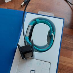 Fitbit fitness tracker size small with original teal strap. In perfect working order but it does have a crack in the screen. It doesn't affect it but is reflected in price. All original packaging box and charger Inc.
From a smoke and pet free home.