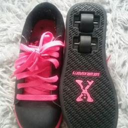 only worn twice pink and black heelys.pick up only