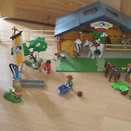 Used. Not in original box. All pieces supplied and tool to put ranch together.
play mobil horses and people included.