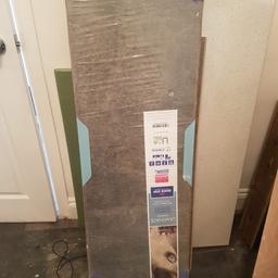 5 packs of Exquisa uniclic slate dark laminate flooring. pick up from Chatham, ME5 7DS or Enfield.