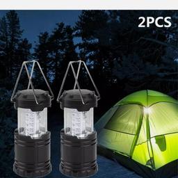 2 new camping lanterns with batteries
