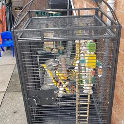 in as new condition only 4 weeks old with toys and feeders also has play stand on top for birds to play and perch when out. pull out trays and wheels to move and clean.