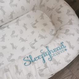 Excellent condition. Was used alternatively with another cover so only had light use. 

This is a beautiful limited edition Forest Friends cover for the Sleepyhead deluxe (0-8 months).

White, with grey animal print, and blue sleepyhead stitching. 

Smoke free home.

Bought new for £75 from John Lewis