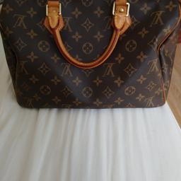 Louis vuitton speedy bag new was £850 bargin orginal used once perfect condition selling £200 ono