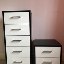 A set of bedroom furniture consisting of a chest of drawers and a side table in black and white. There are some scratches and chips to the surface area (please see attached image) which is to be expected for an item in used condition.

From a smoke free home. 
Social distancing rules apply.
