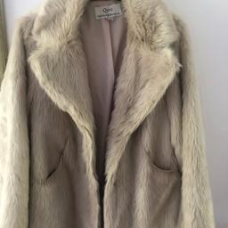 Quiz faux fur coat , size 16 . Great condition, only worn few time .