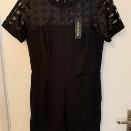 Brand New River Island Black Playsuit in size 10.